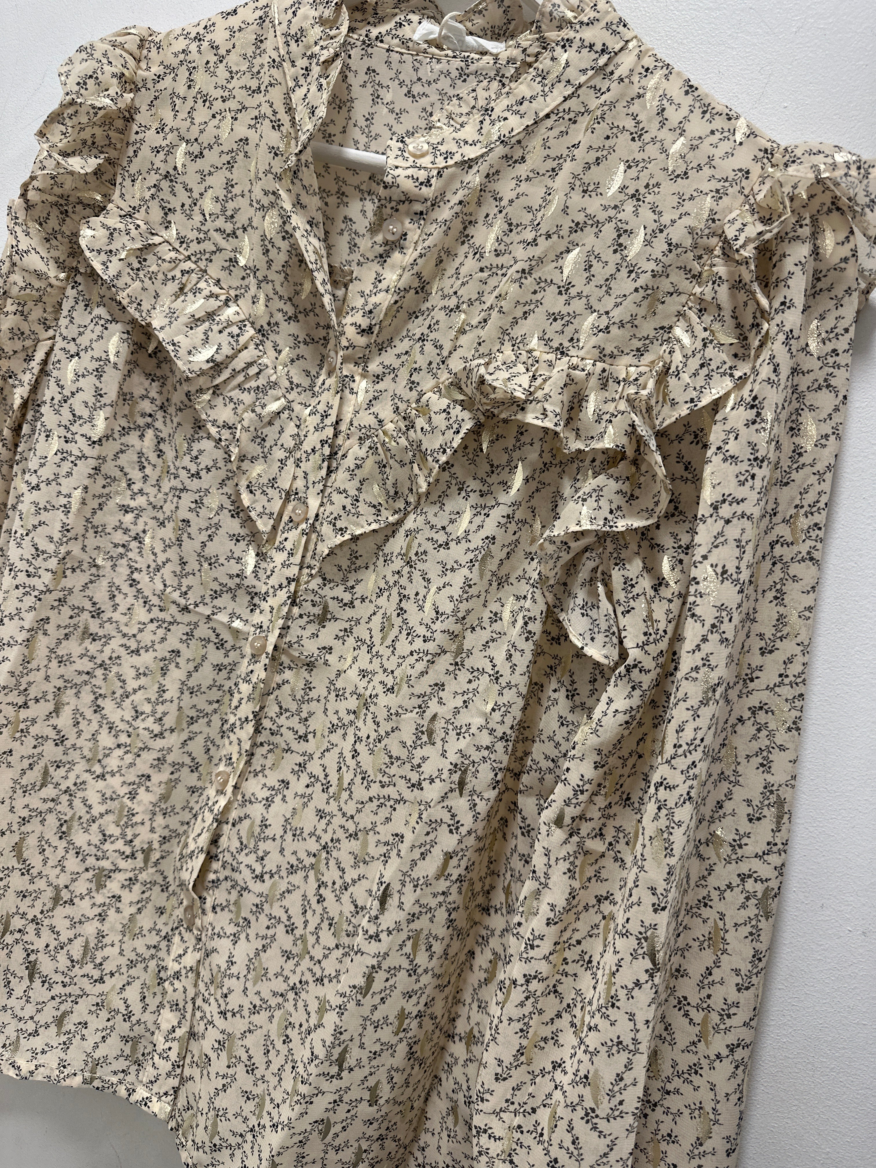 Chemisier beige à motifs